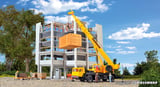 Kibri 12503 LIEBHERR mobile crane LTM 1050/3, yellow